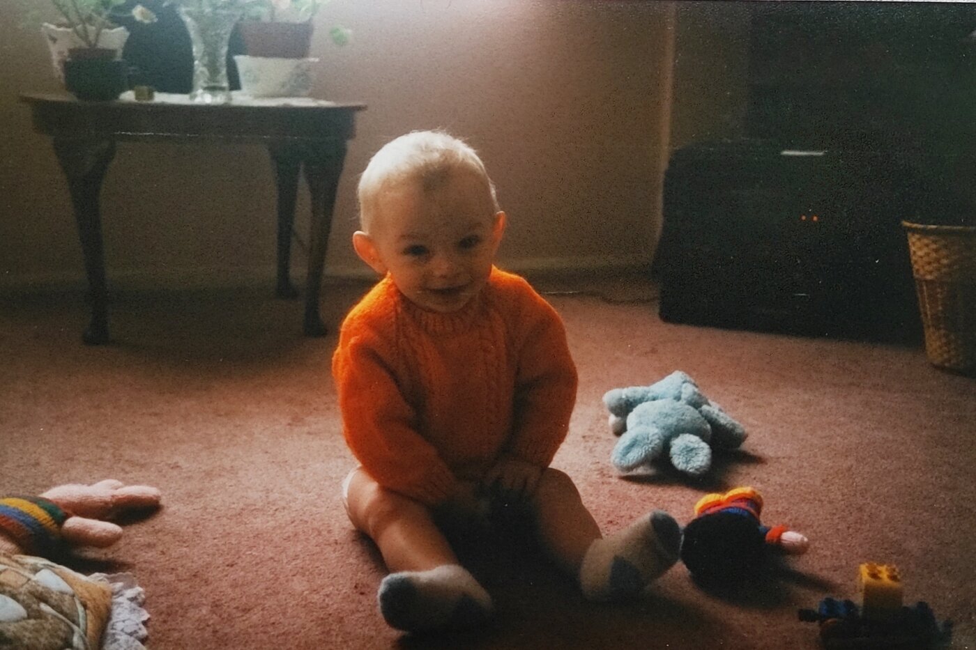 Giz Edwards as a baby, with light shining through his ears