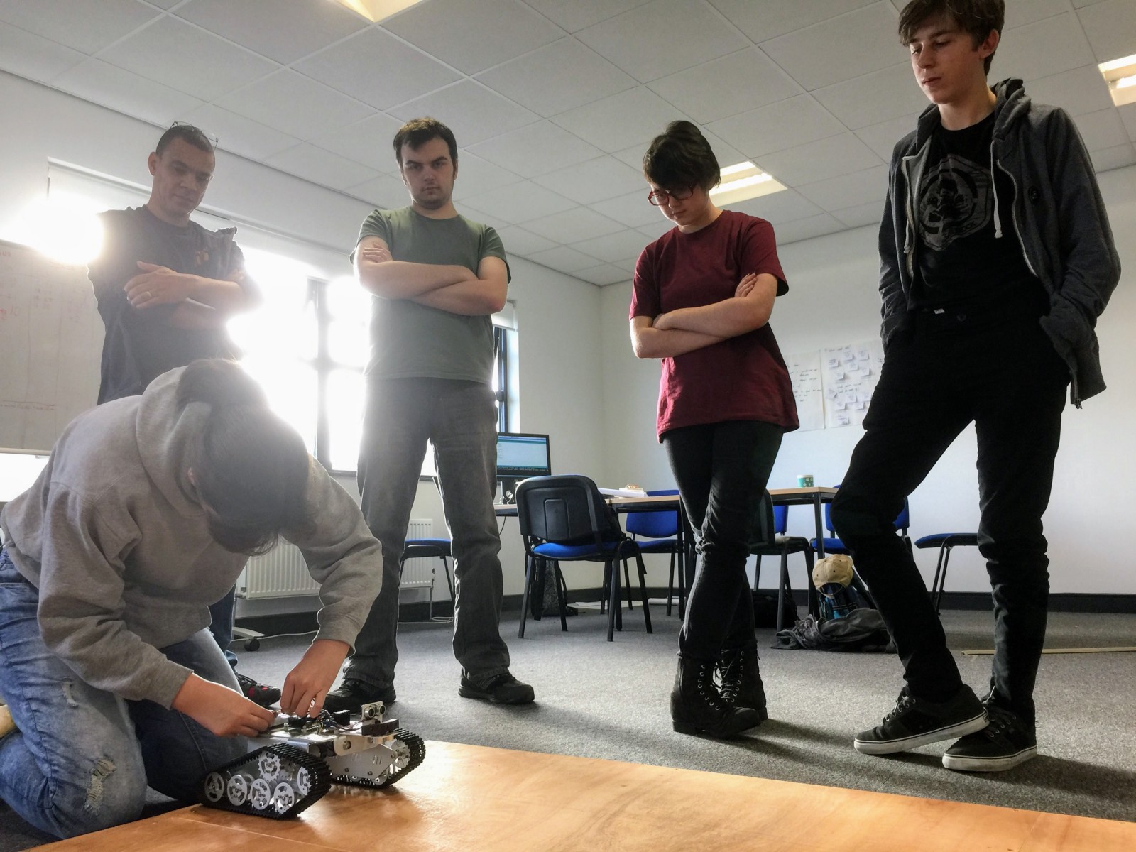Team Indeciders test their code on the rover robots